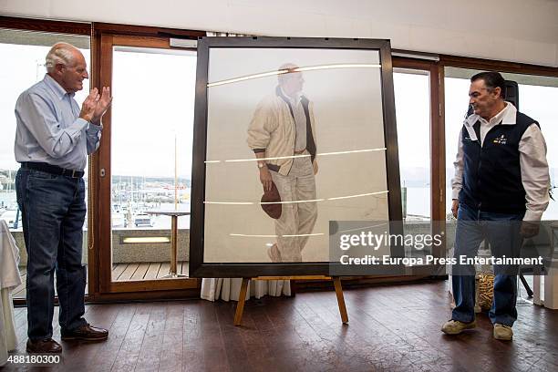 Josep Cusi unveils a King Juan Carlos's portrati during 'Rey Juan Carlos I El Corte Ingles Master' Sailing Trophy on September 11, 2015 in Sanxenxo,...