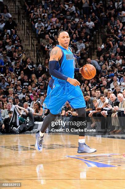 Shawn Marion of the Dallas Mavericks dribbles up the court against the San Antonio Spurs in Game Seven of the Western Conference Quarterfinals during...