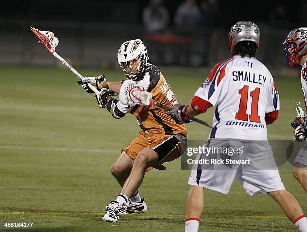 Jordan MacIntosh of the Rochester Rattlers readies to shoot against Matthew Smalley of the Boston Cannons at Sahlen's Stadium on May 2, 2014 in...