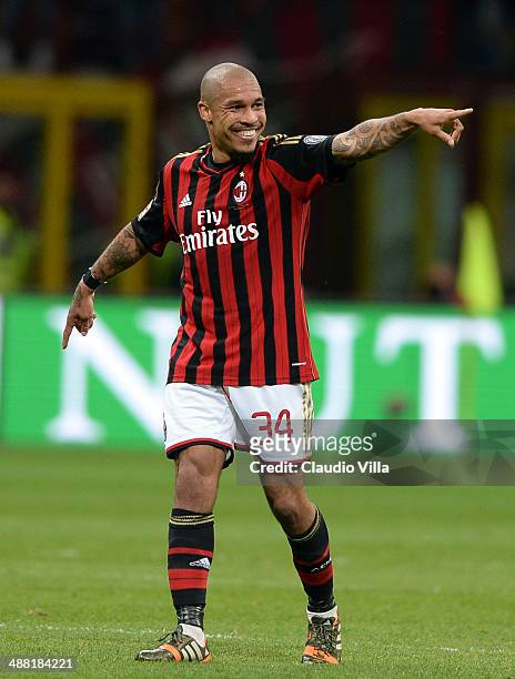 Nigel de Jong of AC Milan celebrates scoring the first goal during the Serie A match between AC Milan and FC Internazionale Milano at Stadio Giuseppe...