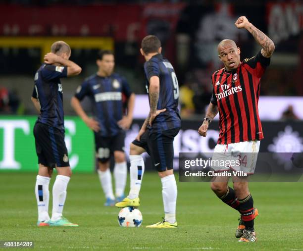 Nigel de Jong of AC Milan celebrates scoring the first goal during the Serie A match between AC Milan and FC Internazionale Milano at Stadio Giuseppe...