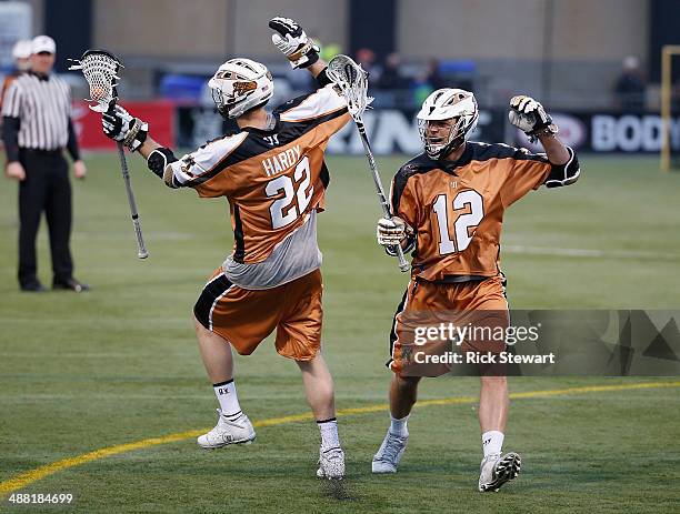 Daniel Hardy and Justin Turri of the Rochester Rattlers celebrate a Rattlers goal against the Boston Cannons at Sahlen's Stadium on May 2, 2014 in...