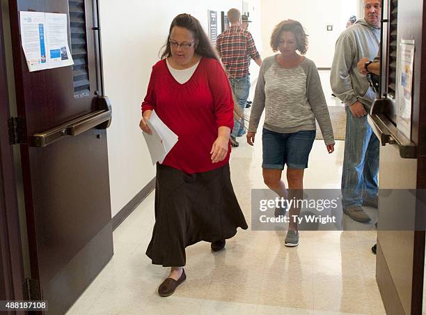 Rowan County clerk Kim Davis walks through the halls of the courthouse on her first day back to work, after being released from jail last week, at...