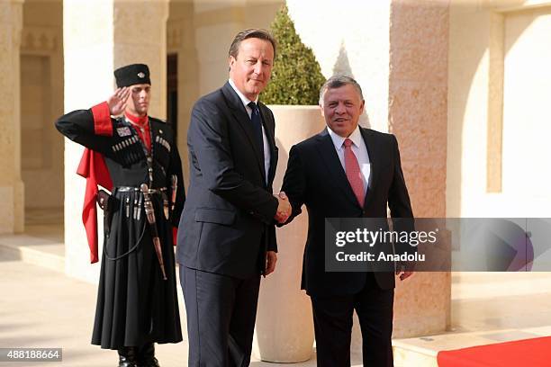 British Prime Minister David Cameron meets with Jordan's King Abdullah II at the al-Huseinia Royal Palace in Amman, Jordan on September 14, 2015.