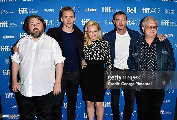 Director Ben Wheatley, actors Tom Hiddleston, Elisabeth Moss, Luke Evans and producer Jeremy Thomas attend the "High-Rise" press conference at the...