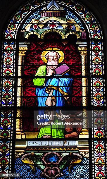 Stained glass window a the Cathedral Basilica of St. Francis of Assisi in Santa Fe, New Mexico, depicts St. Luke the Evangelist.