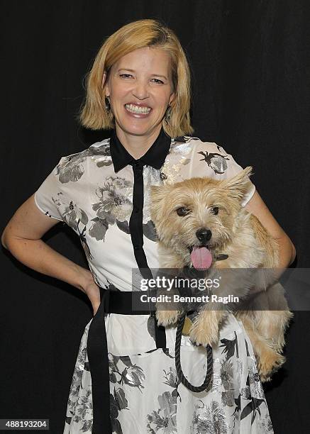 Designer Lela Rose poses for a picture on the backstage with dog Bobbin at the Lela Rose Fashion Show during Spring 2016at The Gallery, Skylight at...