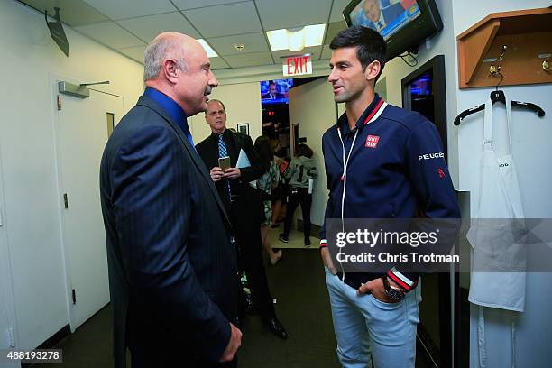 Novak Djokovic of Serbia, the 2015 US Open Men's Singles champion, talks with Dr Phil at the NBC Today Show studio on September 14, 2015 in New York...