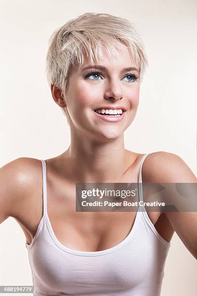 pretty lady with short blonde hair, smiling - pixie cut stock pictures, royalty-free photos & images
