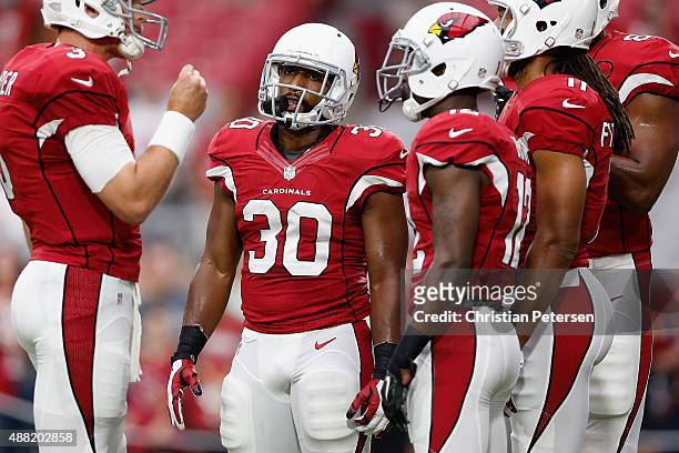 Running back Stepfan Taylor of the Arizona Cardinals warms up before the NFL game against the New Orleans Saints at the University of Phoenix Stadium...