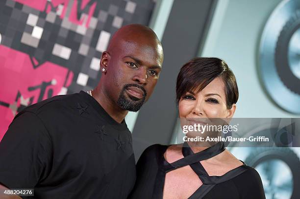 Personality Kris Jenner and Corey Gamble arrive at the 2015 MTV Video Music Awards at Microsoft Theater on August 30, 2015 in Los Angeles, California.