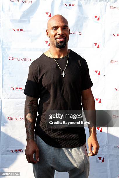 Chicago Bears running back Matt Forte poses for photos during his 'What's Your Forte' Foundation's 'Back To School Book Bag Giveaway' on Chicago's...