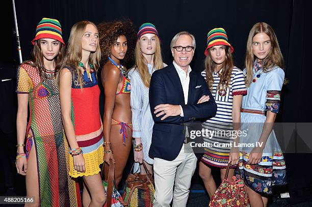 Models pose with designer Tommy Hilfiger backstage at Tommy Hilfiger Women's Spring 2016 during New York Fashion Week: The Shows at Pier 36 on...