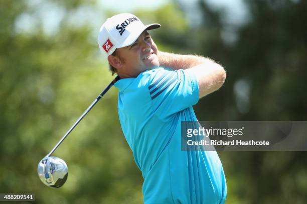 Holmes tee's off at the 4th during the final round of the Wells Fargo Championship at the Quail Hollow Club on May 4, 2014 in Charlotte, North...
