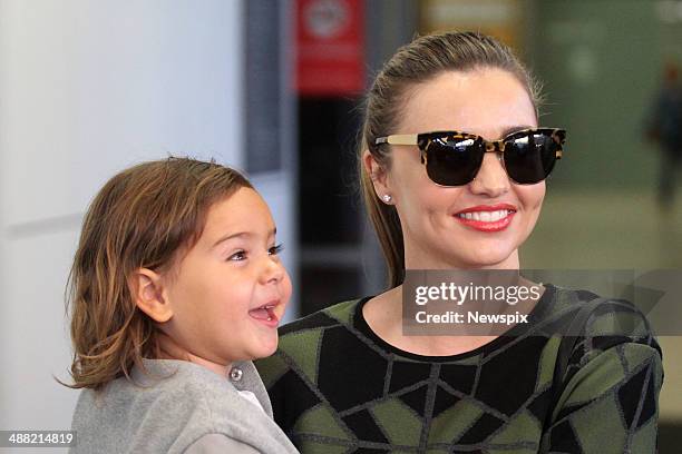 Australian supermodel Miranda Kerr and her son Flynn arrive at Sydney International Airport on a flight from LA, on May 2, 2014 in Sydney, Australia.