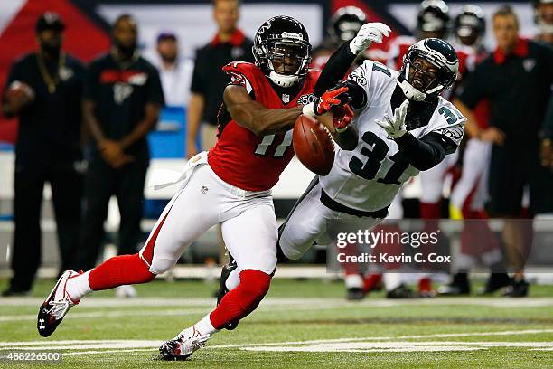 Byron Maxwell of the Philadelphia Eagles breaks up a pass intended for Julio Jones of the Atlanta Falcons during the first half at the Georgia Dome...