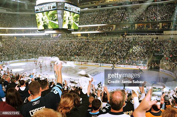 Fans wave their towels as the New York Rangers and the Pittsburgh Penguins take the ice for the start of Game Two of the Second Round of the 2014 NHL...