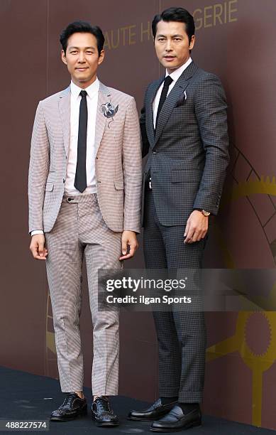 Lee Jung-Jae and Jung Woo-Sung pose for photographs during the Cartier Photocall Event at The Shilla on September 4, 2015 in Seoul, South Korea.