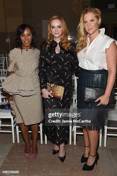 June Ambrose, Christina Hendricks and Amy Schumer attend the Zac Posen Spring 2016 fashion show during New York Fashion Week at Vanderbilt Hall at...