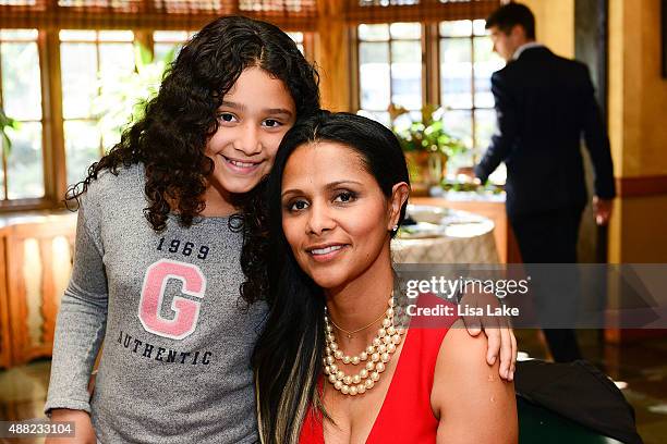 Julietta and Dorys Erving attend Ladies Champagne & Caviar Luncheon hosted by Dorys Erving at Aronimink Golf Club on September 14, 2015 in Newtown,...
