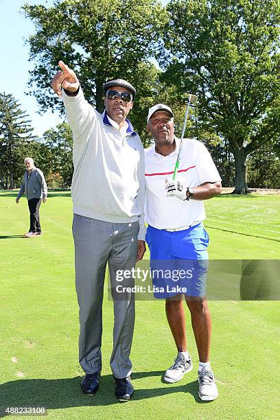 Julius Erving with Joe Carter at the Julius Erving Golf Classic at Aronimink Golf Club on September 14, 2015 in Newtown, Pennsylvania.