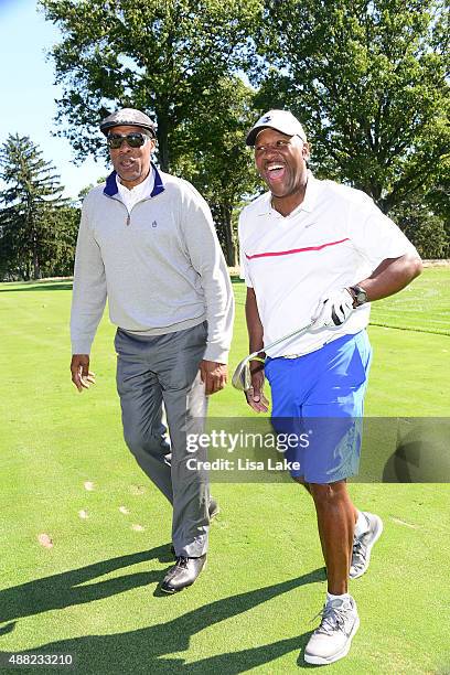 Julius Erving with Joe Carter at the Julius Erving Golf Classic at Aronimink Golf Club on September 14, 2015 in Newtown, Pennsylvania.