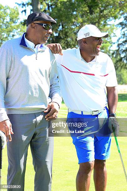 Julius Erving with Joe Carter at the Julius Erving Golf Classic at Aronimink Golf Club on September 14, 2015 in Newtown, Pennsylvania.