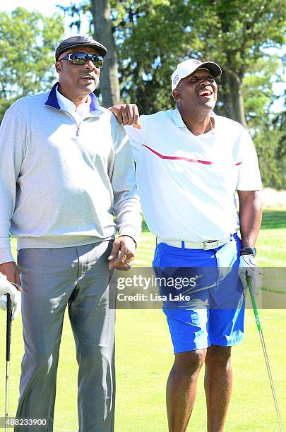 Julius Erving with Joe Carter at the Julius Erving Golf Classic at Aronimink Golf Club on September 14, 2015 in Newtown, Pennsylvania.