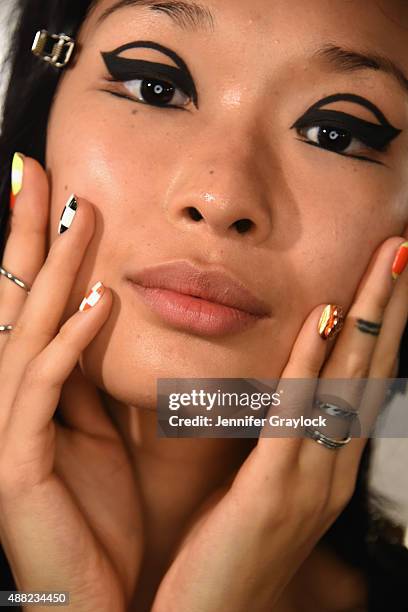 Model poses backstage at the CND for Libertine S/S 2016 fashion show during New York Fashion Week at The Gallery, Skylight at Clarkson Sq on...