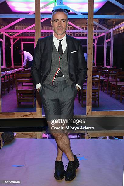 Fashion designer Thom Browne poses backstage at the Thom Browne Spring 2016 fashion show during New York Fashion Week at Skylight Modern on September...