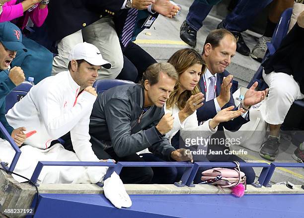 Severin Luthi, Stefan Edberg, coach of Roger Federer, Mirka Federer his wife and Tony Godsick his agent react during the Men's Singles Final match on...