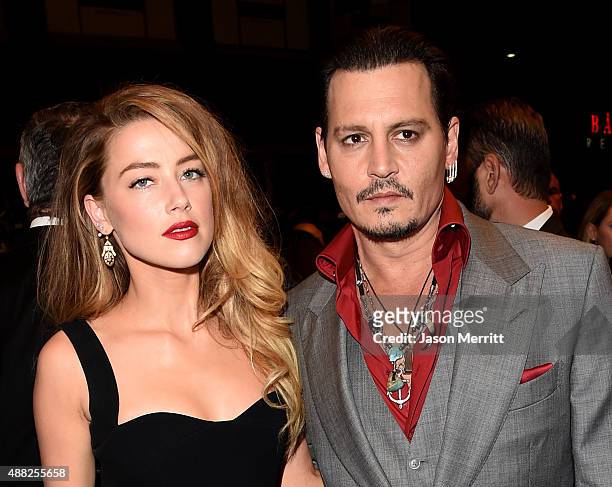 Actors Amber Heard and Johnny Depp attend the "Black Mass" premiere during the 2015 Toronto International Film Festival at The Elgin on September 14,...