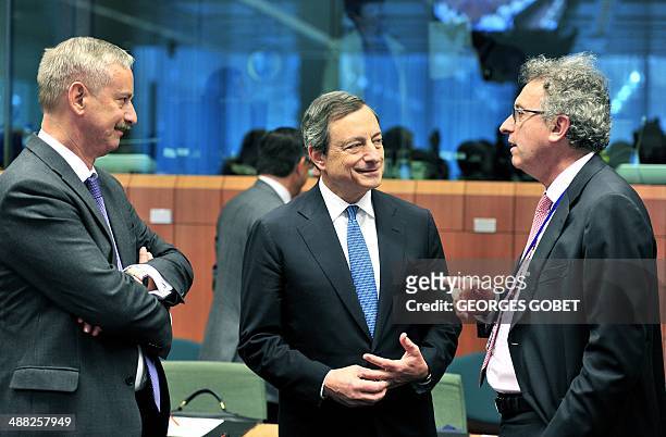 Acting vice-President for Economic and Monetary Affairs Sim Kallas, European Central Bank President Mario Draghi and Luxembourg Finance Minister...