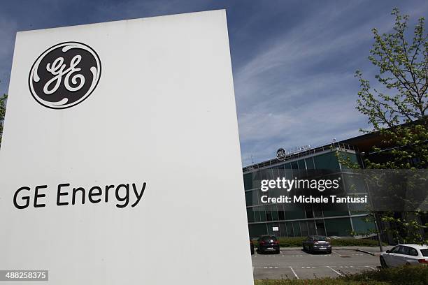 The company Logo of engineering Company General Electric hangs on the Wall of the directional Building on May 5, 2014 in Belfort, France. General...