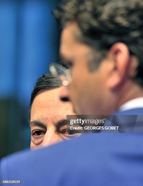 European Central Bank president Mario Draghi and Dutch Finance Minister and Eurozone President Jeroen Dijsselbloem talk prior an Eurozone meeting on...