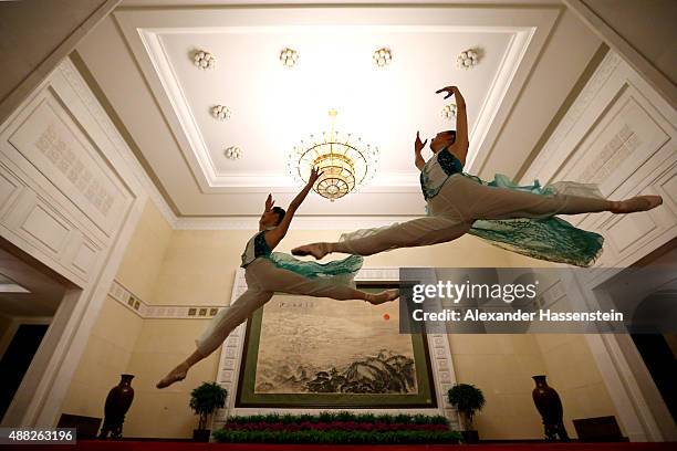 Chinese Ballett dancers showing their skills prior to the IAAF Congress Opening Ceremony at the Great Hall of the People at Tiananmen Square on...