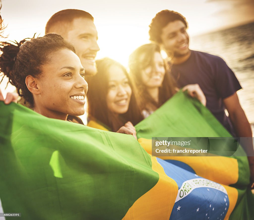 Brazil supporter cheering togetherness at the beach soccer match