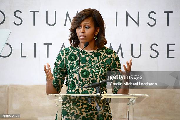 First Lady of the United States Michelle Obama speaks onstage at the Anna Wintour Costume Center Grand Opening at the Metropolitan Museum of Art on...