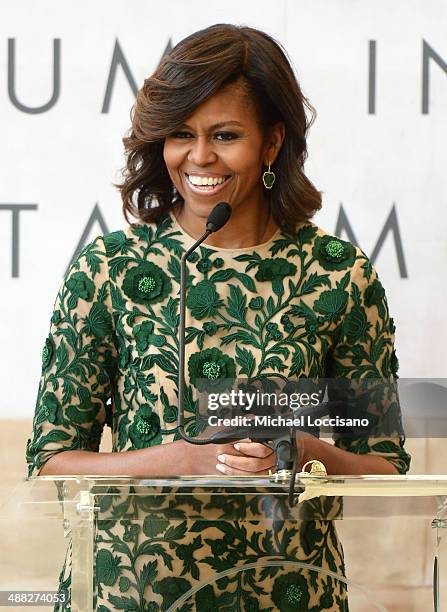 First Lady of the United States Michelle Obama speaks onstage at the Anna Wintour Costume Center Grand Opening at the Metropolitan Museum of Art on...