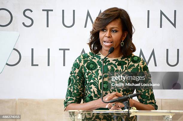 First Lady of the United States Michelle Obama speaks onstage at the Anna Wintour Costume Center Grand Opening at the Metropolitan Museum of Art on...