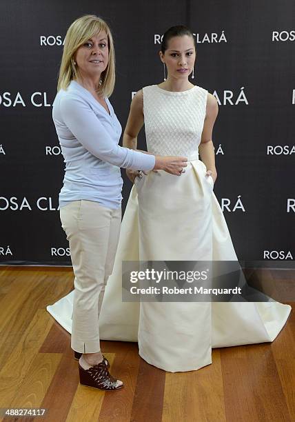 Gabriella Lenzi and designer Rosa Clara pose for the press during a fitting for designer Rosa Clara and will be presented during the 'Barcelona...