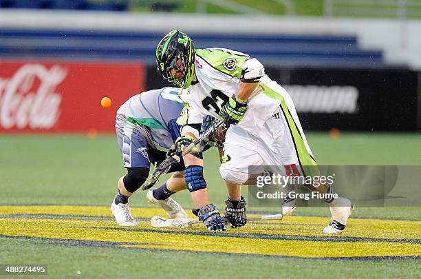 Greg Gurenlian of the New York Lizards takes the face-off against Adam Rand of the Chesapeake Bayhawks at Navy-Marine Corps Memorial Stadium on May...