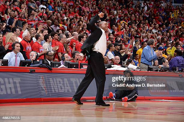 Head coach Doc Rivers of the Los Angeles Clippers pumps his fist in Game Seven of the Western Conference Quarterfinals against the Golden State...