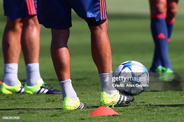 Alejandro Dominguez balances the ball on his foot during a Olympiacos FC training session ahead of their UEFA Champions League Group F match against...