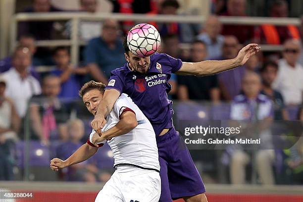 Nenad Tomovic of ACF Fiorentina in action against Diego Capel of Genoa CFC during the Serie A match between ACF Fiorentina and Genoa CFC at Stadio...