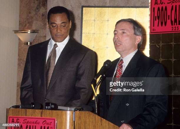 Athlete Al Cowlings and his attorney Donald Re attend a press conference on February 15, 1995 at the New Otani Hotel and Gardens in Los Angeles,...