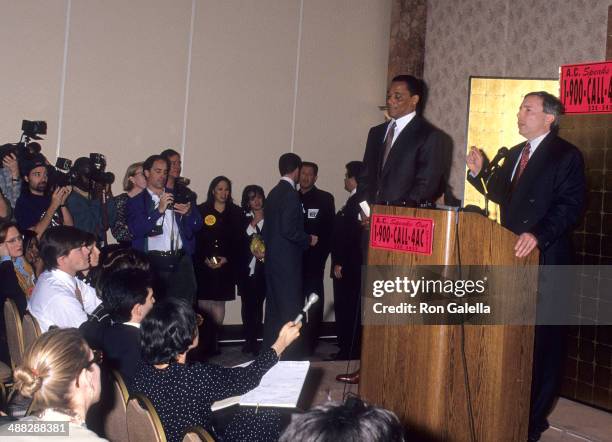 Athlete Al Cowlings and his attorney Donald Re attend a press conference on February 15, 1995 at the New Otani Hotel and Gardens in Los Angeles,...