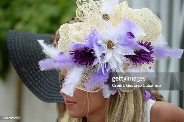 Guests attend the Moet & Chandon Toasts The 140th Kentucky Derby at Churchill Downs on May 2, 2014 in Louisville, Kentucky.