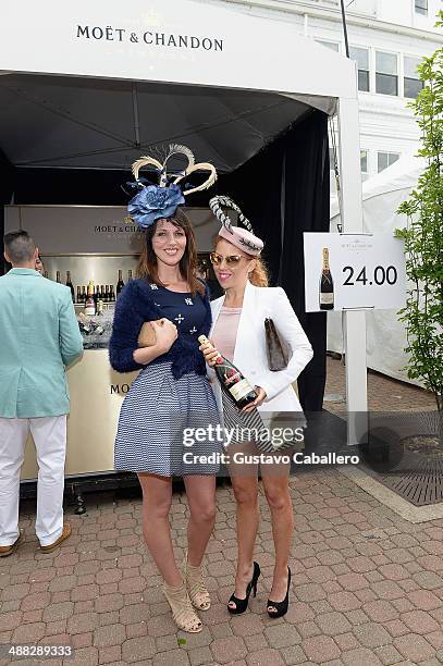 Guests attend the Moet & Chandon Toasts The 140th Kentucky Derby at Churchill Downs on May 2, 2014 in Louisville, Kentucky.