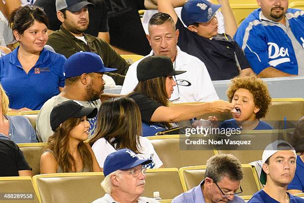 Xzibit and Krista Joiner attend a baseball game between the Colorado Rockies and the Los Angeles Dodgers at Dodger Stadium on September 14, 2015 in...